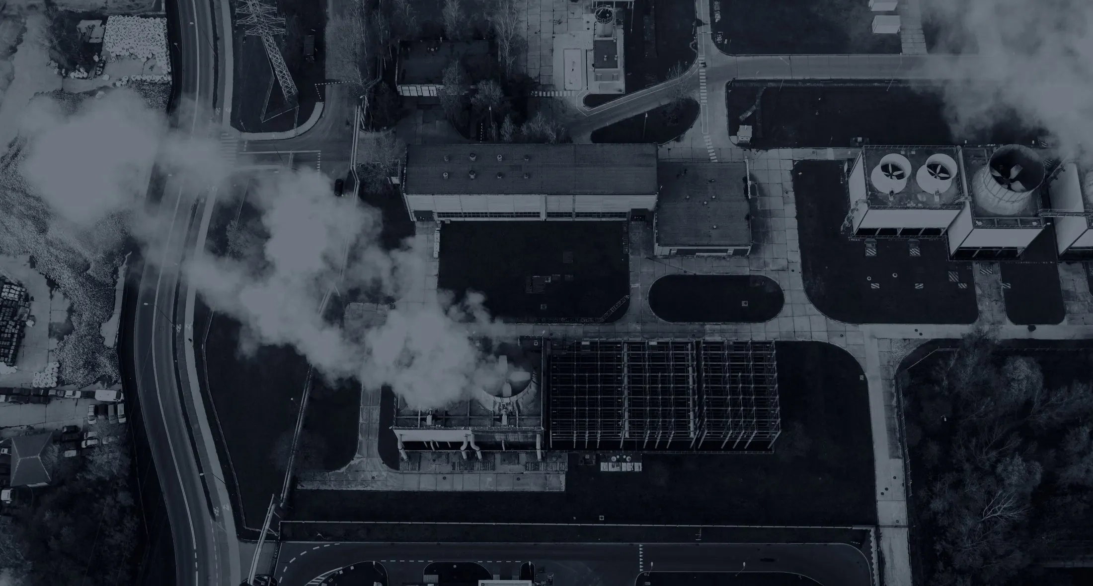 Aerial photo of a power station at night, in black and white